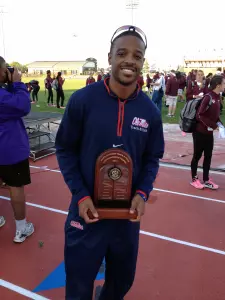 Isiah Young, pictured here with his 2013 SEC Commissioner's Trophy (photo by Joey Jones)