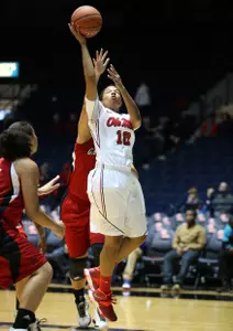 Diara Moore leads Rebels with 17 points.