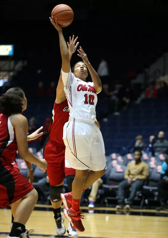 Diara Moore leads Rebels with 17 points.