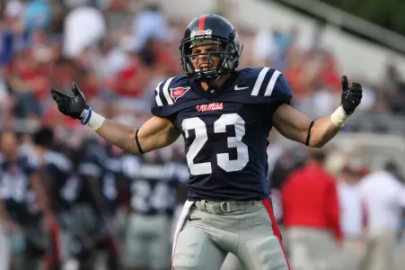 Former Ole Miss player George Helow seeks his second straight national championship as a coach.