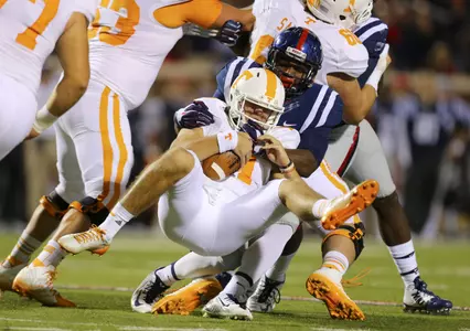 Marquis Haynes sacks UT's Justin Worley. (photo by USA TODAY Sports)