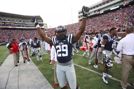 David Kamara raises his arms in the sign of victory. (photo by Joshua McCoy)