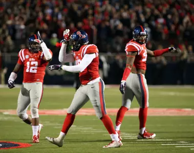 Tony Conner and C.J. Johnson throwing up Landsharks during the Egg Bowl win. (photo by Joshua McCoy)