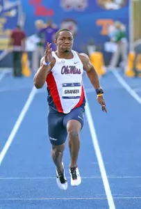 Senior Mike Granger helped the 4x100m relay team set a school record Saturday. (photo by Joshua McCoy)