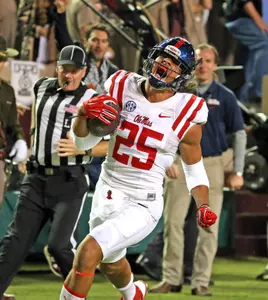Cody Prewitt celebrates his pick-six against the Aggies. (photo by Joshua McCoy)