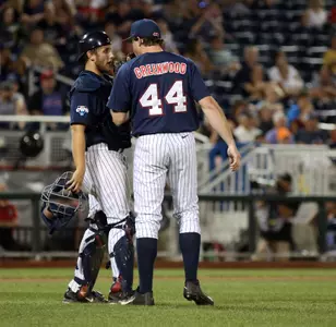 Austin Knight (left) visits with former Ole Miss pitcher Aaron Greenwood