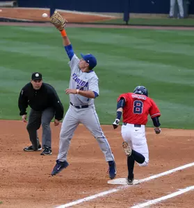Golsan beats out an infield single in a win over No. 1 Florida