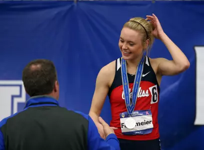 Brooke Feldmeier receives her silver medal at the SEC indoor meet. (photo by Joshua McCoy)