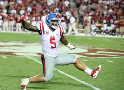 Robert Nkemdiche celebrates a fourth-quarter sack at Bryant-Denny Stadium. (photo by Joshua McCoy)