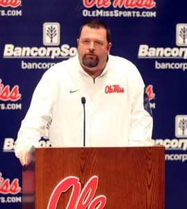 Coach Mott speaking at Monday's press conference