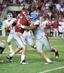 Robert Nkemdiche sacks Alabama QB Jake Coker during the Rebels' win in Tuscaloosa. (photo by Joshua McCoy)