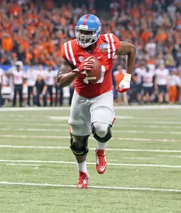 Laremy Tunsil scores a touchdown in the Allstate Sugar Bowl. (photo by Joshua McCoy)