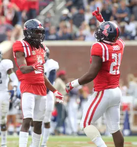 Seniors Quincy Adeboyejo and Akeem Judd (photo by Joshua McCoy)
