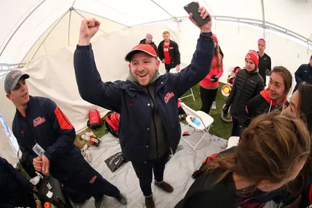 Coach Ryan Vanhoy celebrates with his teams after their historic performances at the 2016 NCAA Cross Country Championships.