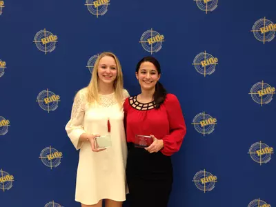 Junior Alison Weisz and assistant coach Melissa Quartarone