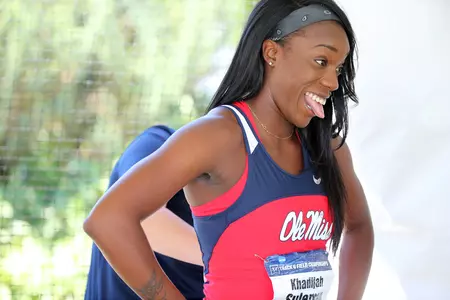 Khadijah Suleman relaxes while preparing for the 4x100m relay at the 2015 NCAA Outdoor Championships in Eugene, Oregon. (photo by Joshua McCoy)
