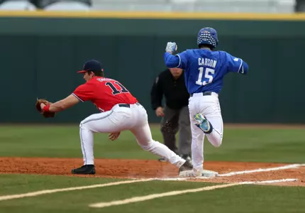 Chase Cockrell stretches to get the out at first (Photo by Britney Howard)