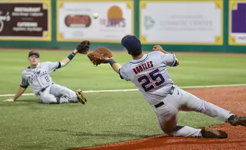 Colby Bortles makes a sliding catch in foul territory Thursday night at Alex Box Stadium.