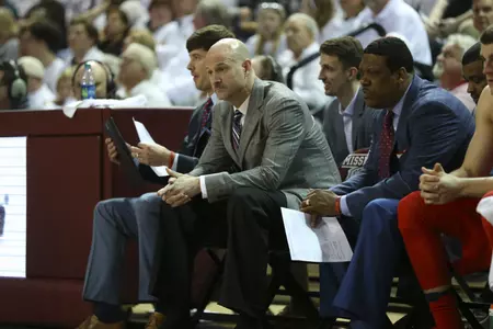 Andy Kennedy (center) has stepped down as Ole Miss Men's Basketball Head Coach; Tony Madlock (far right) will serve as acting head coach.