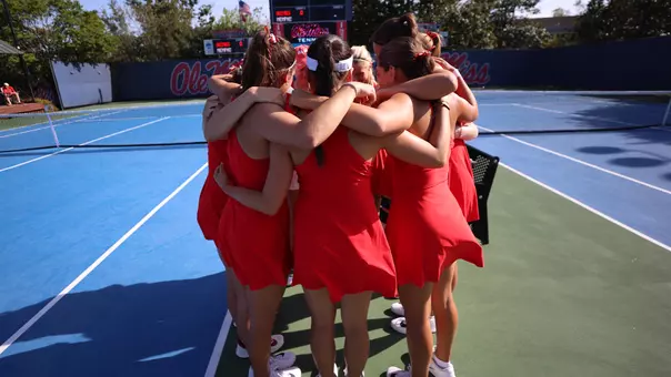 Women's Tennis Team Huddle