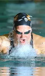 Swimming Holds Orange and Black Meet