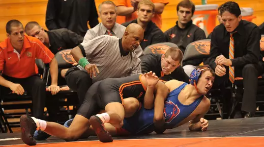 Coaches watch Joey Delgado