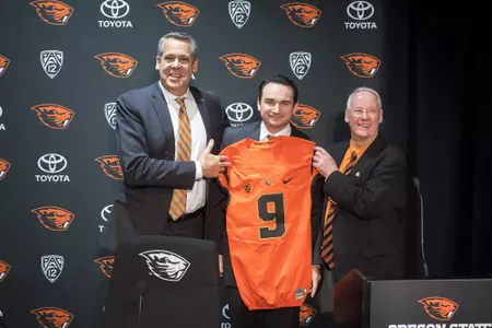 Coach Smith with VP/A.D. Scott Barnes and OSU President Ed Ray