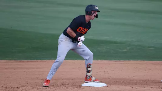 Paul Vazquez celebrates after hitting a double at UC Irvine