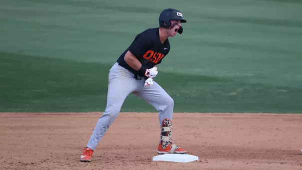 Paul Vazquez celebrates after hitting a double at UC Irvine