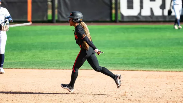 Jada Lewis celebrates her walk-off grand slam while running the bases