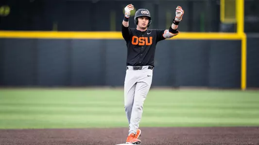 Ethan Porter celebrates after hitting a double against Oregon