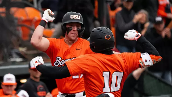 Paul Vazquez and Bryce Hubbard celebrate after the latter hit a home run versus Xavier on March 8, 2026