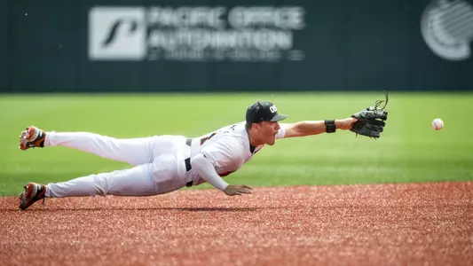 Cooper Vance dives to field a ground ball against Cal State Fullerton on April 19, 2026