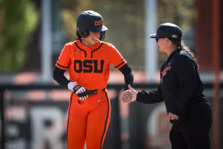 Lici Campbell high fives assistant coach Jenny Topping