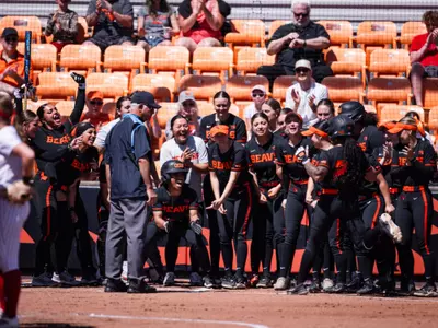 Jaeya Butler crosses home plate after a home run.