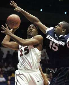 RICHMOND DOWNS TEMPLE, 64-49, IN A-10 QUARTERFINAL ROUND Image