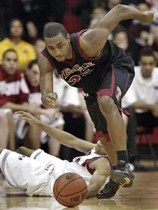 FORDHAM FINALLY ENDS SKID AGAINST TEMPLE WITH 54-47 WIN Image