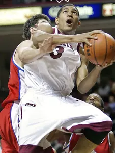 SALISBERY LEADS OWLS TO 50-46 BIG 5 CLASSIC WIN OVER QUAKERS Image