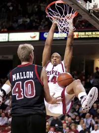 SAINT JOSEPH'S DOWNS TEMPLE, 63-56, IN A-10 AND BIG 5 CLASH Image