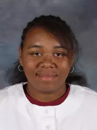 COMPTON COMES THROUGH IN PINCH TO LIFT SOFTBALL TO WIN OVER RHODE ISLAND Image