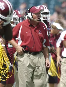 FOOTBALL TO HOLD OFFENSE VERSUS DEFENSE SCRIMMAGE SATURDAY Image
