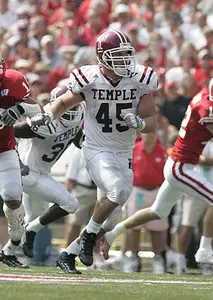 WISCONSIN DOWNS TEMPLE IN LOPSIDED CONTEST, 65-0 Image