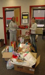 SAAC Donates Toys, Money to Women's Shelter Image