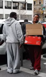 Temple Football Makes Thanksgiving Deliveries Image