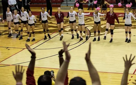 Volleyball team celebration after SMU