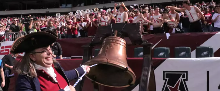 Ben Franklin rings the Liberty Bell in front of a large cheering crowd