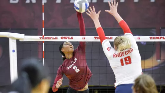 Peyton Boyd attacks in a match earlier this fall