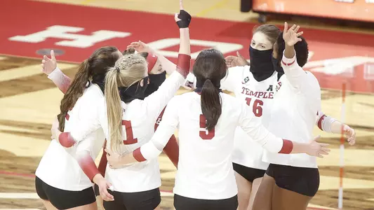 Temple Volleyball huddles during a win over Cincinnati on March 26, 2021.