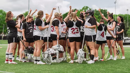 Lax practice huddle - AAC