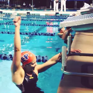 Jessica Mosbaugh celebrates her race win.